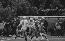 Freelance sportfotograaf legt sportmoment vast in actie